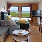Апартаменты Wellenreiter Direkt Am Mit Meerblick Und Eingez Garten